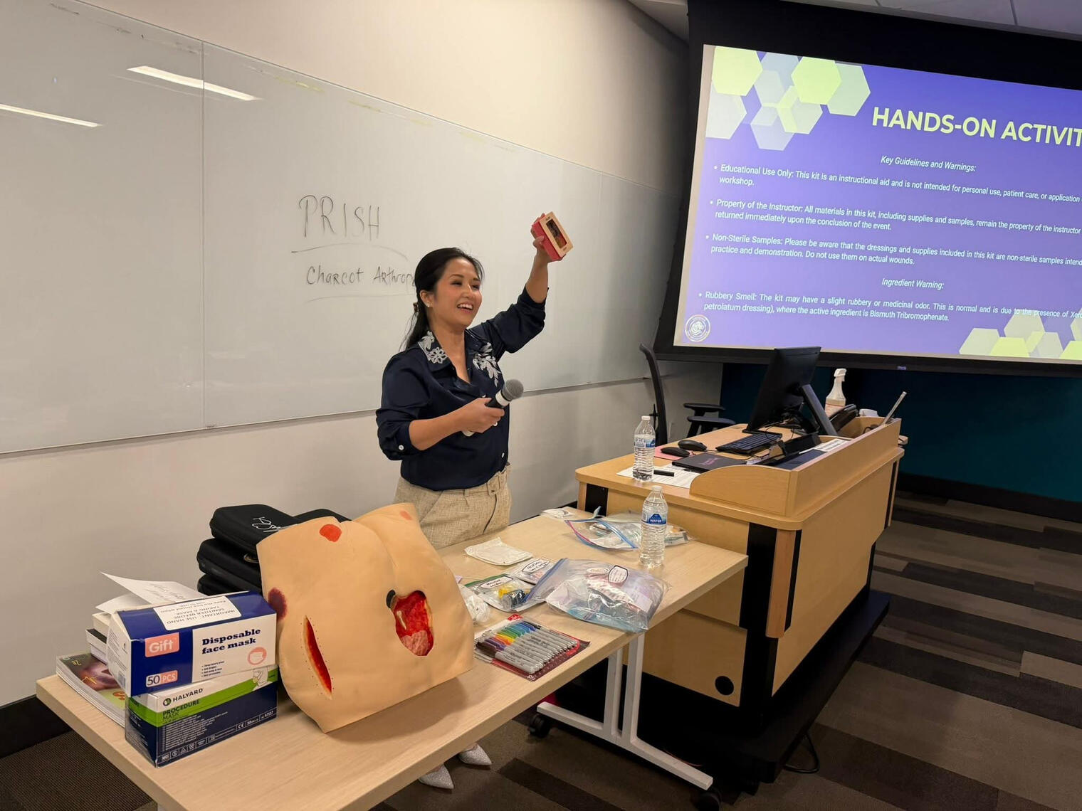 Establishing the Standard of Care Lionessa Wound Strategies lead clinician delivering a clinical logic briefing on wound management standards.